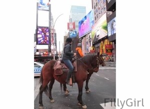 Riding-a-horse-in-nyc's-Times-Square