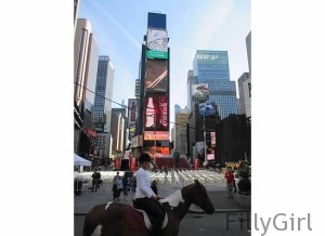 Riding-a-horse-in-times-square-where-they-drop-the ball-on-New-Year's-eve